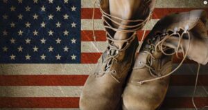the-traditional-flag-and-boots-memorializing-one-who-gave-it-all
